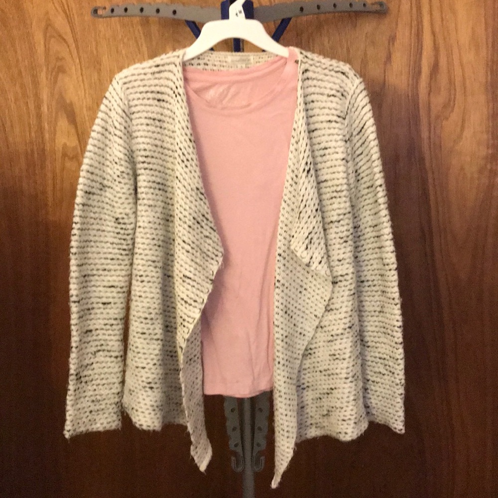 Asymmetrical cardigan.